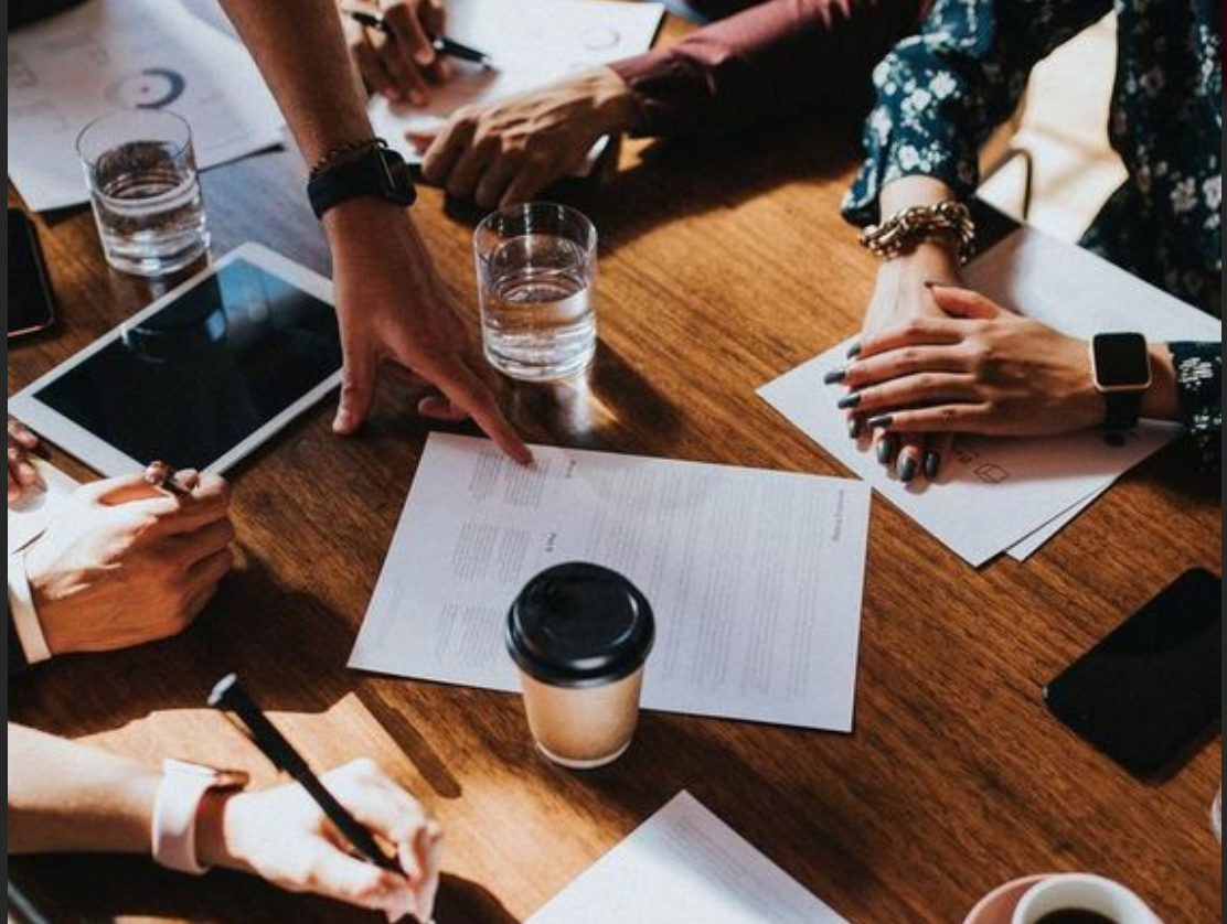 People working together at a table.